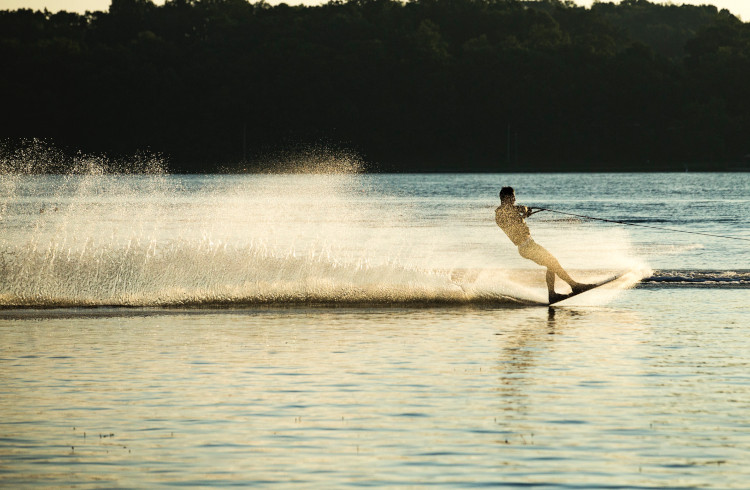 A student water-skiing on Baw Beese Lake.